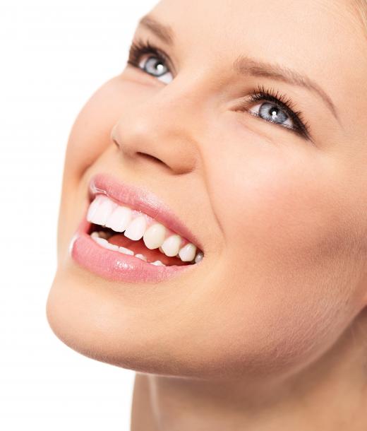 Bonding uses resins that closely match the color of surrounding teeth to correct imperfections or other problems.