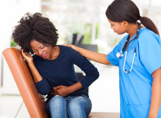 Pelvic pain and cramping are common symptoms of uterine fibroid tumors.