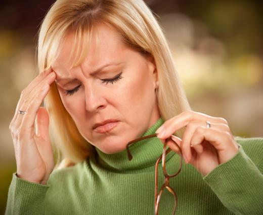 Headaches and vision problems can be caused by an enlarged pituitary gland.